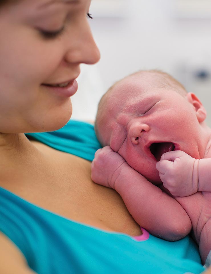 Mother Holding Her Baby 1